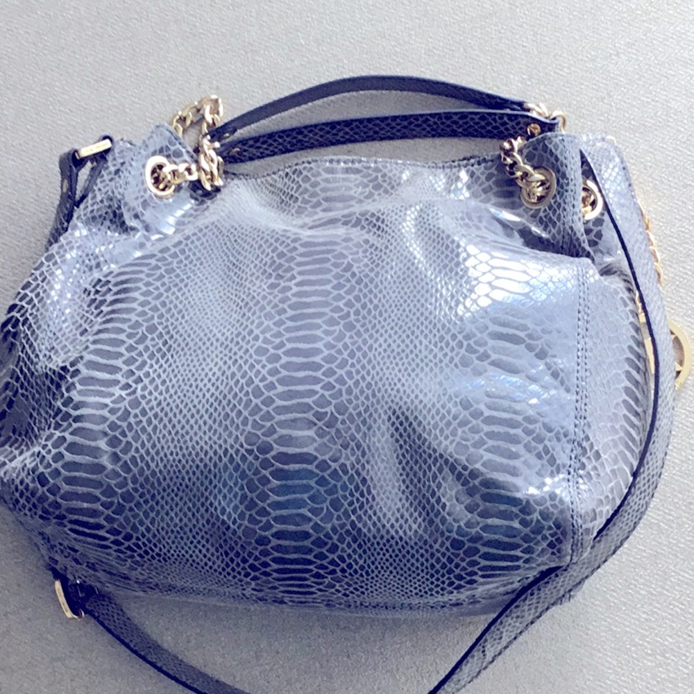 Michael kors slightly used snakeskin light blue